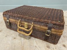 A mid-century wicker picnic hamper, fitted for six places with plates, cutlery, mugs and sandwitch