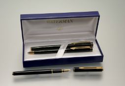 A Waterman Exclusive green marble lacquer finish fountain pen and pencil set with 18k gold nib, in