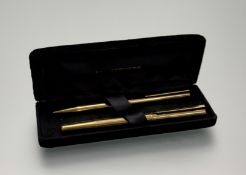 A vintage Waterman fountain pen and ballpoint set, gold plated, 18k nib, original box