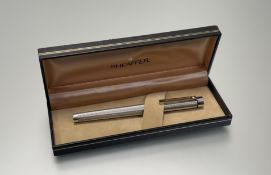 A vintage silver plated Sheaffer Targa fountain pen, boxed