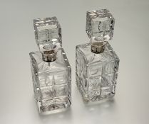 A pair of 1970's silver-mounted cut-glass decanters, Israel Freeman & Son Ltd. London 1973, each