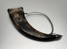 A white metal mounted flattened cowhorn powder flask, applied with an heraldic unicorn, the cap