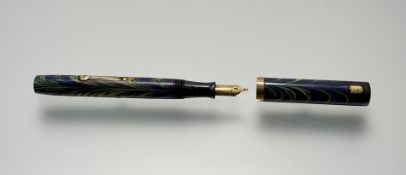 An antique Waterman 94 fountain pen, blue/green ripple pattern, original Waterman keyhole nib,