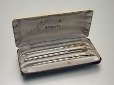A vintage 65 Flighter de Luxe trio; fountain pen, ballpoint and pencil, in original box