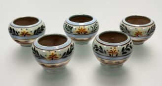 A collection of five Mid-Century Hartrox Stoneware polyanthus bowls in the Peasant pattern with pale