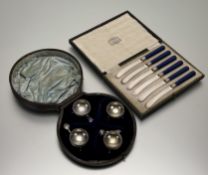 A Victorian Charles Edwards London silver set of four table cauldron salt sellers with beaded rims