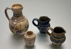 A collection of Studio Clay work comprisng two Ewenny clay pots one in a olive green and blue