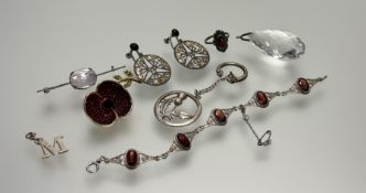 A collection of jewellery to include a large faceted crystal pear-shaped pendant: l. x 5cm, white