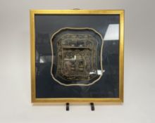 A Chinese escutcheon/door plaque for a cabinet with metal mounts and brass detail, carved with