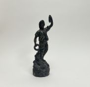 A bronze figure of a fisherman holding a lifebuoy and a rope, raised on a spelter rock (repairs to