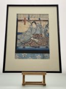 Utagawa Kunisada (Japanese 1786-1864), a seated Lady in a Kimono, woodblock print, in a glazed frame