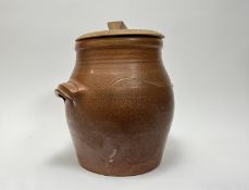 A stoneware salt glazed flour crock with wooden cover and handle, complete with swirl detail and