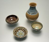 A collection of Studio Pottery comprising, a Holkham Pottery Celtic Rope pattern bottle vase (marked