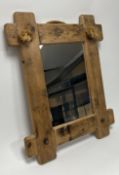 A rustic pine-framed mirror with rope hanging string (w.57 x h. 70cm)