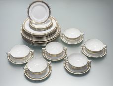 A Royal Worcester Golden Anniversary pattern part dinner service comprising, six twin handled soup