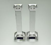 A pair of Villeroy & Boch lead crystal square tapered candlesticks, both with original lable to