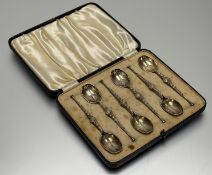 A Birmingham silver set of six silver gilt anointing style tea spoons with seal terminals: l. x 11cm