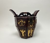 A Chinese octagonal wedding box and cover, gilt decorated with figures, birds, and flowers and