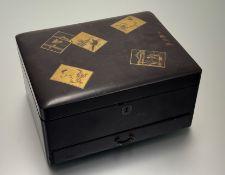 An early 20thc Japanese brown-lacquered writing box, signed with four-character marks to the top,