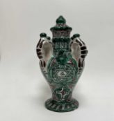 A Spanish Pottery Domingo Punter Vessel with loop handles, in green and black craqualure glaze,
