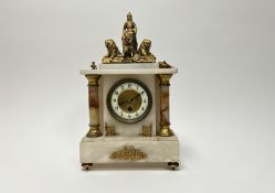 A late 19thc French marble and gilt metal-mounted mantle clock, the dial complete with Arabic hour