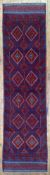 A modern hand-knotted Afghan Meshwani runner, central panel with two rows of repeating diamond