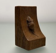 A Robert Mousean Thompson oak single book end with carved mouse patinated sides: h. x 15.5cm l. x