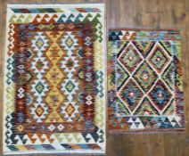 A modern hand-knotted Chobi kilim rug: l.x 127cm w.x 85cm, and a smaller Chobi kilim rug with