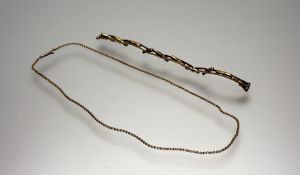 A 9ct gold expanding watch bracelet 5.25g and an Edwardian 9ct gold double link chain necklace