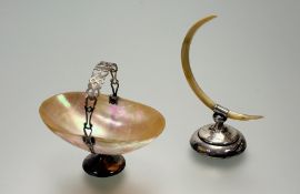 A George V Birmingham silver-mounted abalone shell sweets dish with swing handle raised on