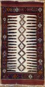 A flat-woven Kurdish kilim rug, central panel with row of interconnected diamond motifs flanked by