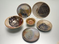 A collection of Diana Worthy Crich Pottery comprising, four plates each decorated with floral