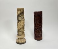An early 20thc Chinese hand-carved bamboo pot intricately carved with scholars within a bamboo