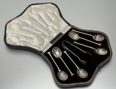 A Birmingham silver set of six seal handled tea spoons and set of tongs in original fitted moss