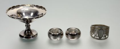 A Birmingham silver scalloped sugared almond dish with scalloped rim on a circular weighted base