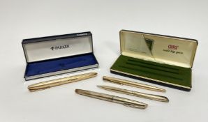 A Parker 1/10th 12ct rolled gold fountain pen with ribbed body and cap, marked 'W.L.' to body,