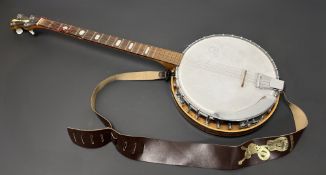 A Kay KB54 five-string banjo, with mother of pearl inlay to the fretboard, and complete with