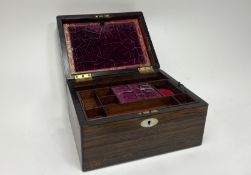A Victorian rosewood ladies sewing/travelling box, with hinged top revealing fitted interior, mother