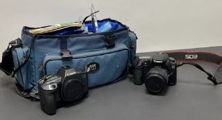 A Jessop blue canvas camera bag, together with a Canon EOS 600 camera, an EOS 20D camera, Jessops