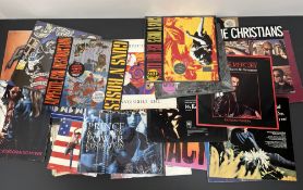 A collection of vinyl records comprisng; The Beatles 'A Hard Days Night', Simon Garfunkel '