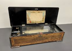 A 19thc Swiss table top music box playing 10 ayres including 'The Blue Bells of Scotland', ''The