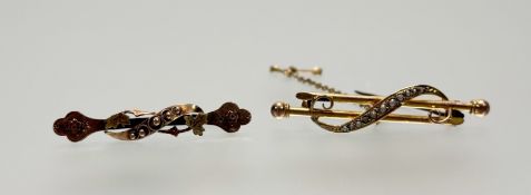 An Edwardian 9ct gold double bar brooch set seed pearls with safety chain: l. x 4.5cm and an
