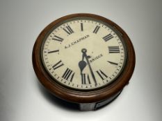A 19thC mahogany cased wall clock with Roman numeral painted dial and brass frame, complete with