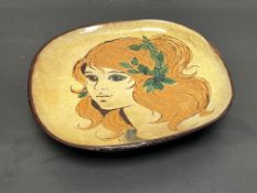A Barbara Ross for Chelsea Pottery large footed dish decorated with a girl to the front with green