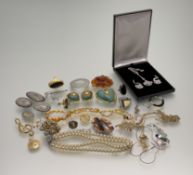 A collection of costume jewellery to include a converted clasp/ brooch, a Austrian gilt lustre