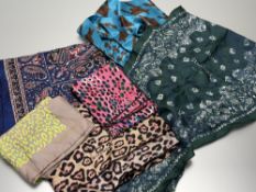A mixed group of silk scarves including a Givenchy leopard print scarf (33