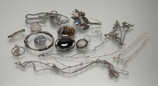 A collection of white metal and silver jewellery to include a spray pin brooch set pink cabochon and