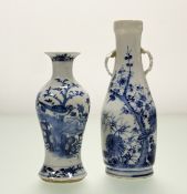 An 19thc Chinese blue and white bud vase, with perched bird amongst foliage (two blue ring marks