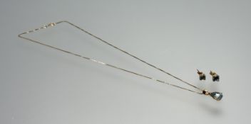 An Italian 9ct gold mounted aquamarine pear-shaped pendant approximately 0.5ct mounted on 9ct gold
