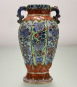 A 19thc Japanese vase, with moulded panel scenes to body depicting flowering chrysanthemums and